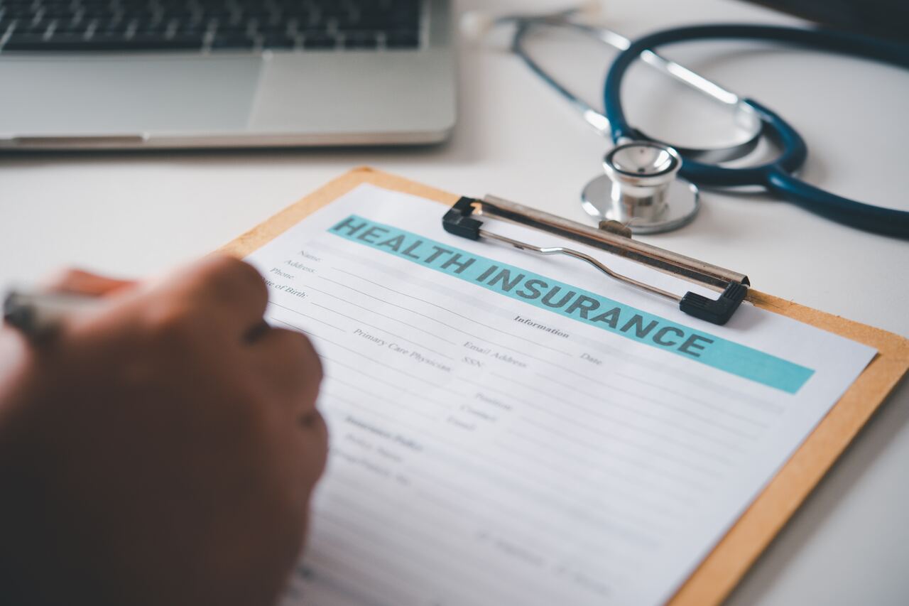 Filling out a health insurance form